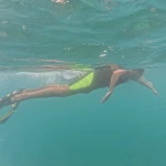 Snorkeller swimming with fins, snorkelling in Havelock Island