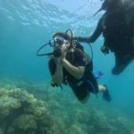 Diver with the instructor right behind her, RAID Master Rescue Diver course in Havelock, Andaman