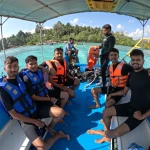 Group of divers in life jackets on the dive boat, Red Pillar scuba diving, Havelock Island