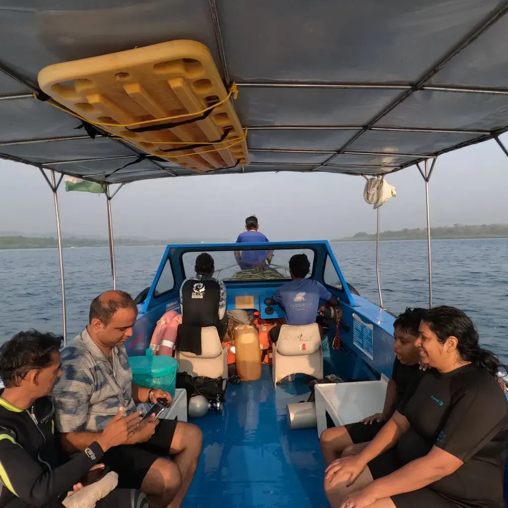 Guests seated on the boat heading out to sea, island hopping from Havelock