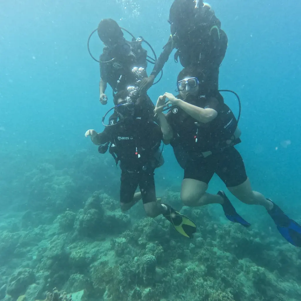Two divers above the reef, RAID Open Water course in Havelock, Andaman