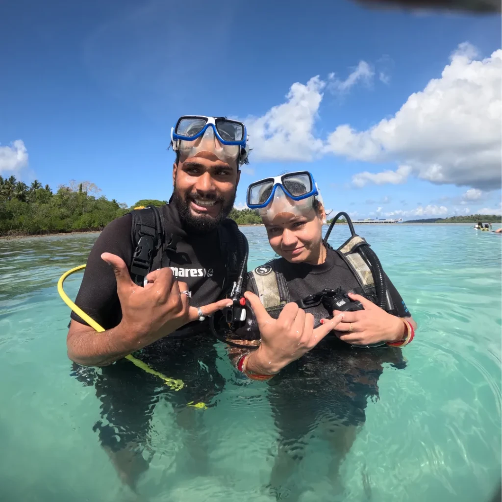 Shore scuba diving in Andaman - friends in scuba gear before their dive at Havelock