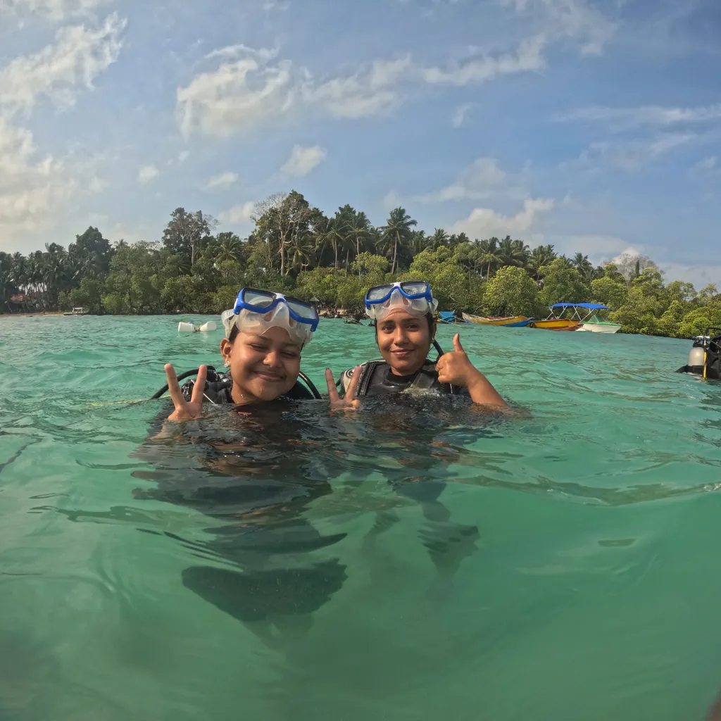 Two guests at the surface after a Tribe Gate scuba dive off Govind Nagar, Havelock