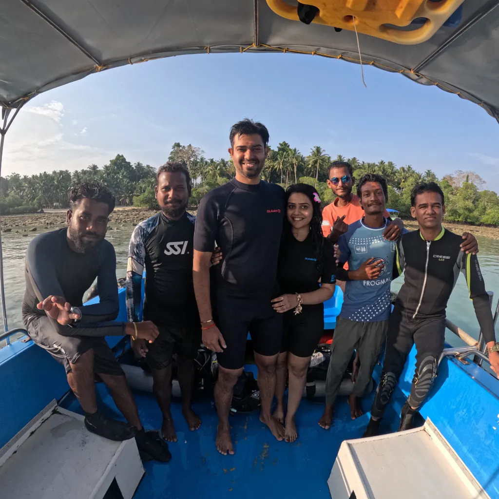 Frogman crew and guests on the dive boat before a Tribe Gate scuba dive, Govind Nagar, Havelock