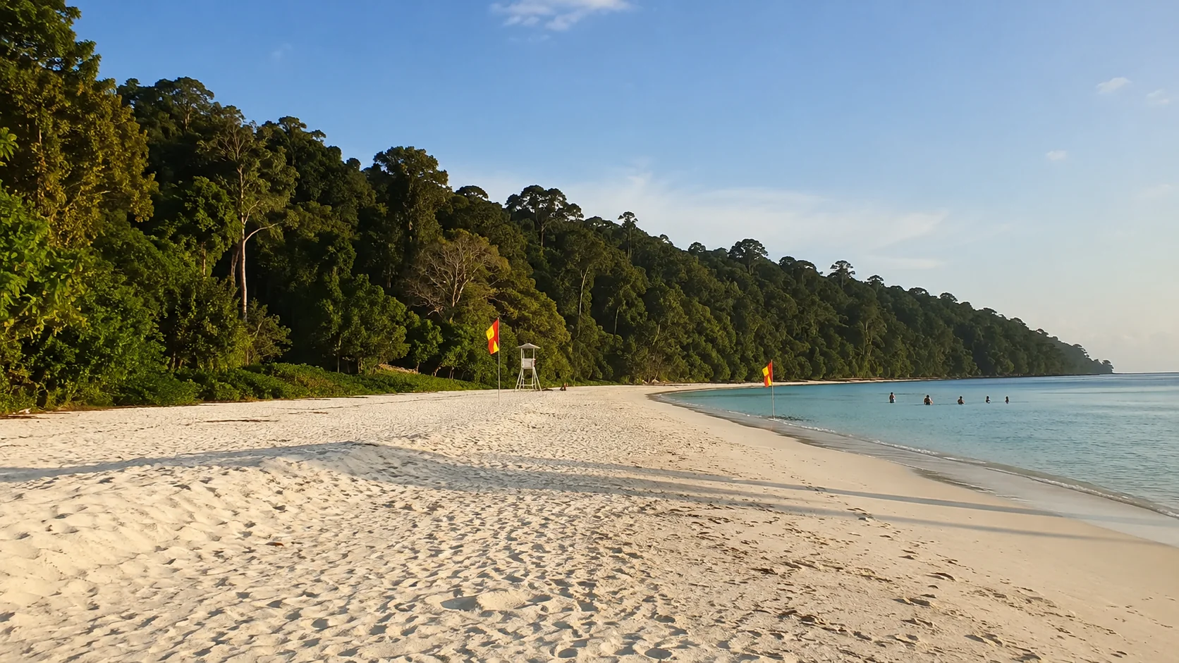 Lifeguard flags marking the swimming zone at Radhanagar Beach, Havelock Island