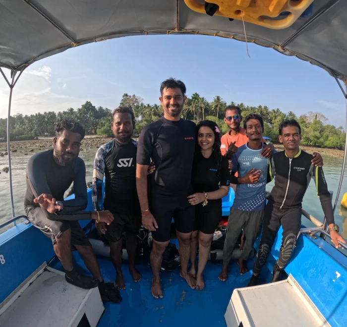 Dive group standing together on the boat before Havelock Island scuba diving