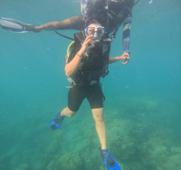 Diver with a camera close to the surface