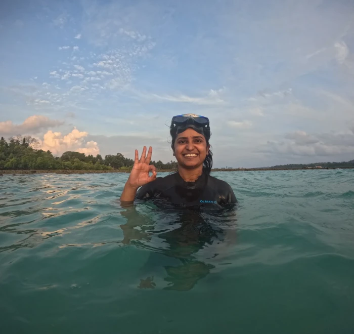 Guest giving the OK sign at the surface before descending