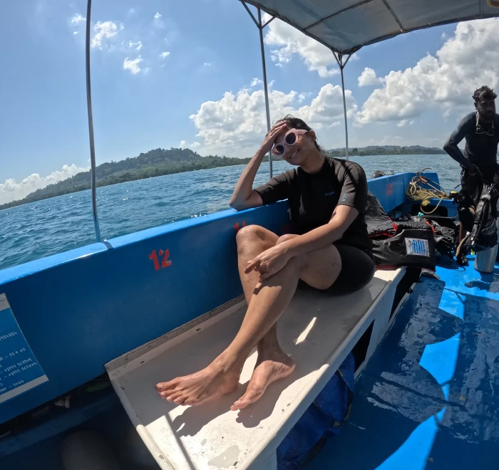 Guest relaxing on the dive boat between dives